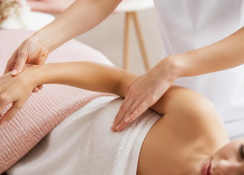Gentle lymphatic drainage massage performed on a client
